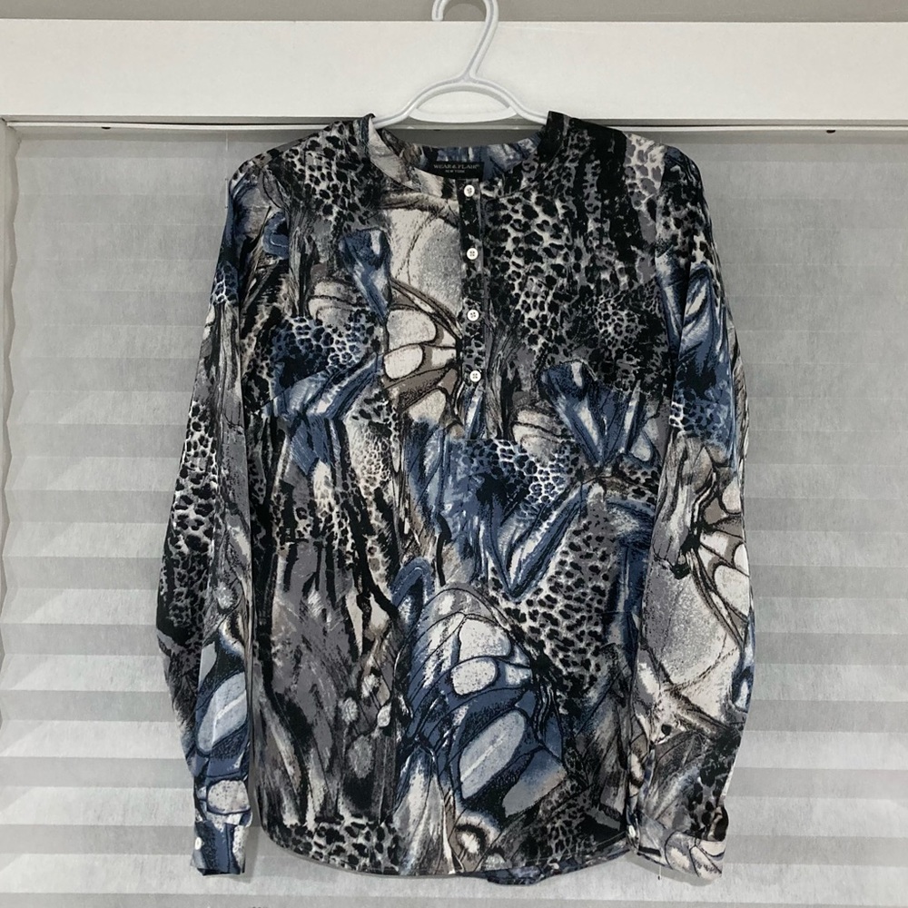 Womens blouse with blue, grey, and black print
